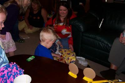 Matthew opening his presents